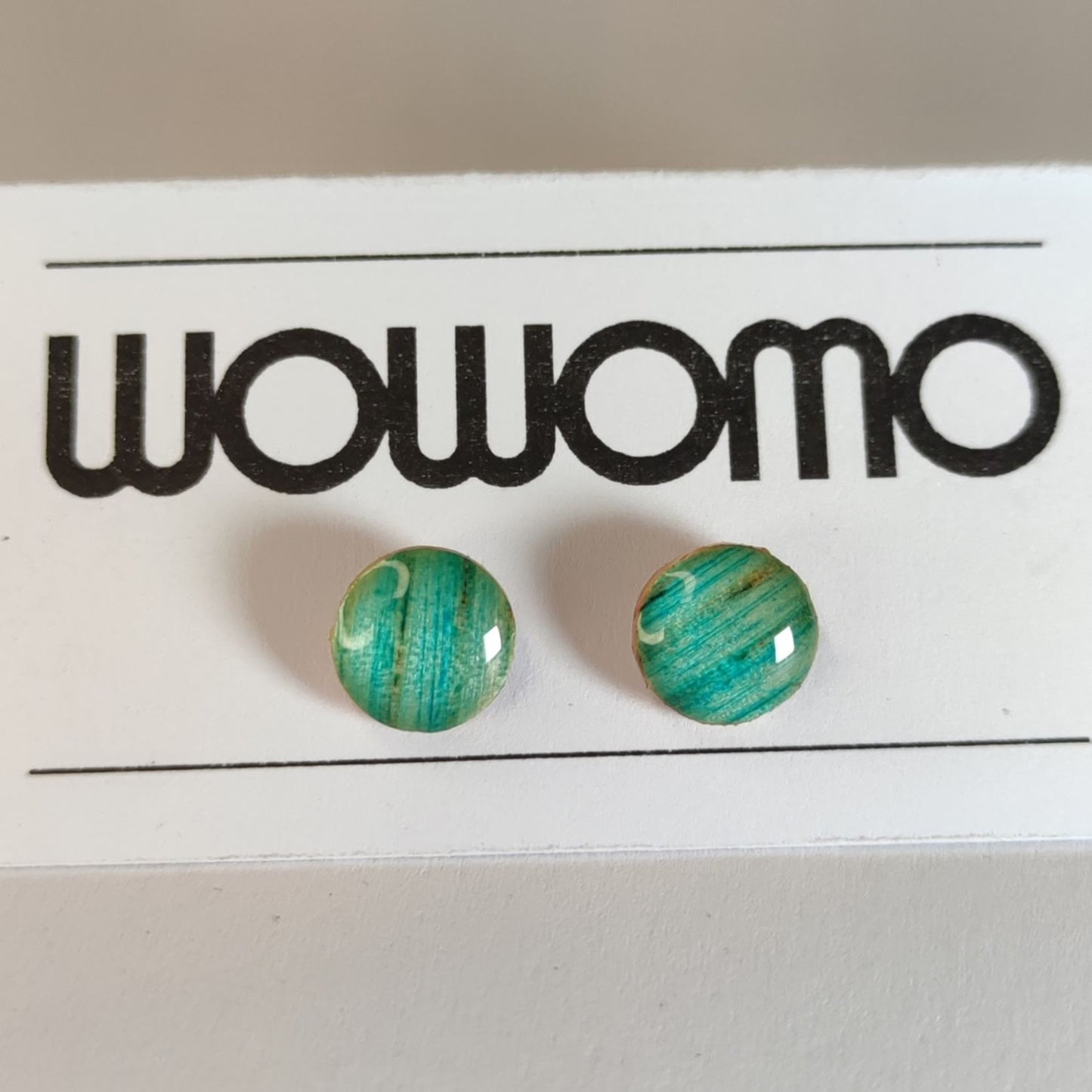 L4-9MM pendientes WOWOMO en su expositor